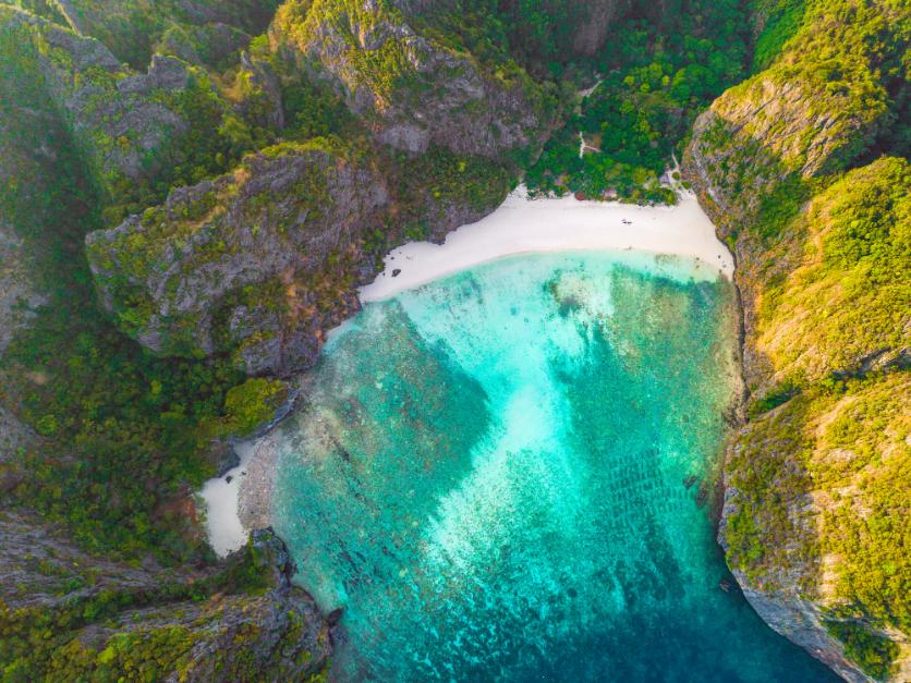 hidden beach paradise surrounded by turquoise lagoon