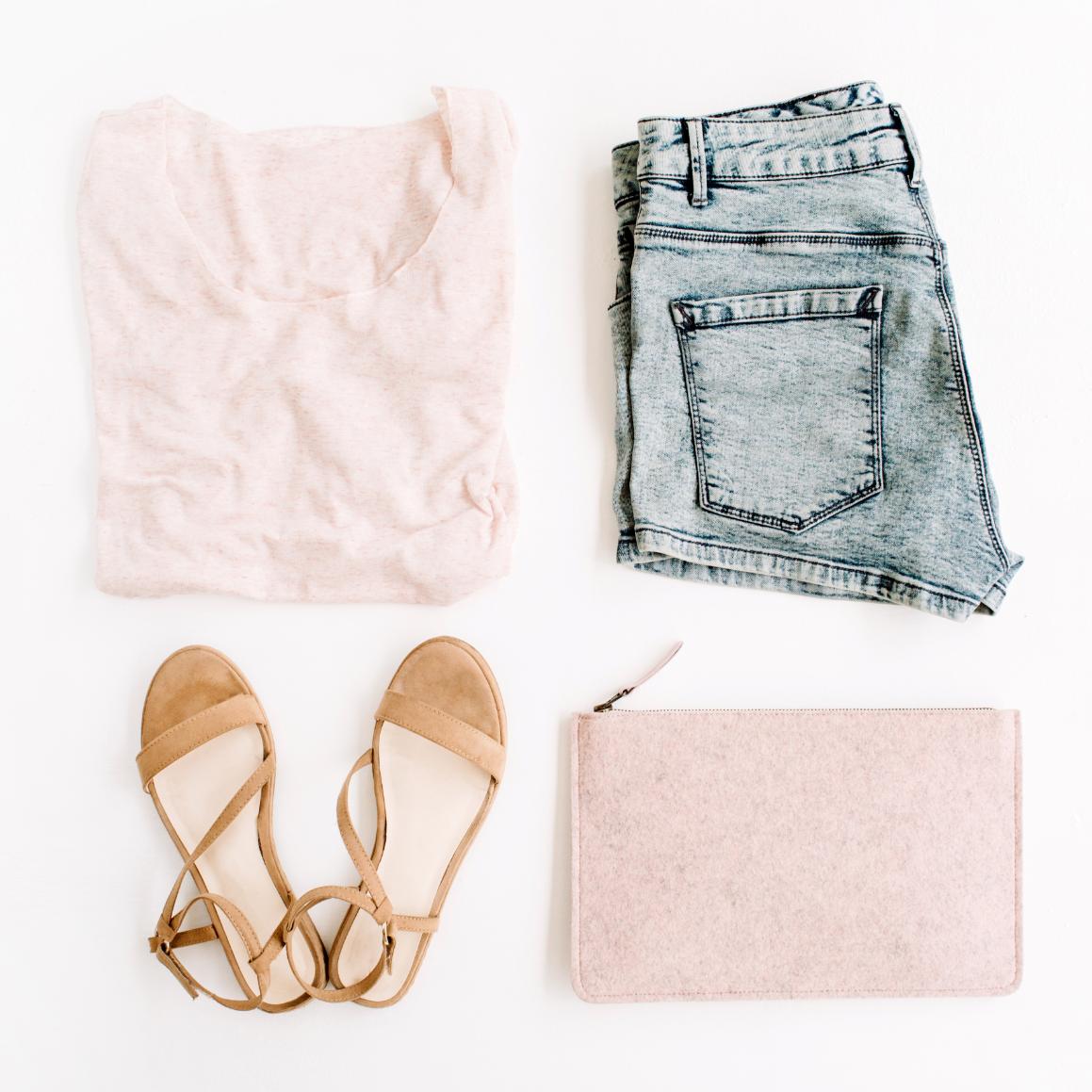 Classic white button-down shirt styled in minimalist women fashion