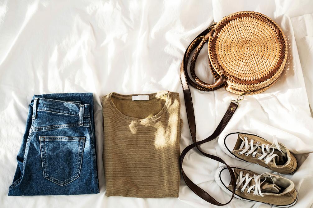 Classic white button-down shirt styled in minimalist women fashion